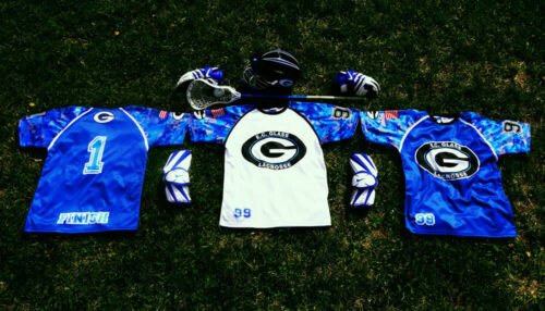 Black and Royal Blue lacrosse shooter shirt with clean panel styling